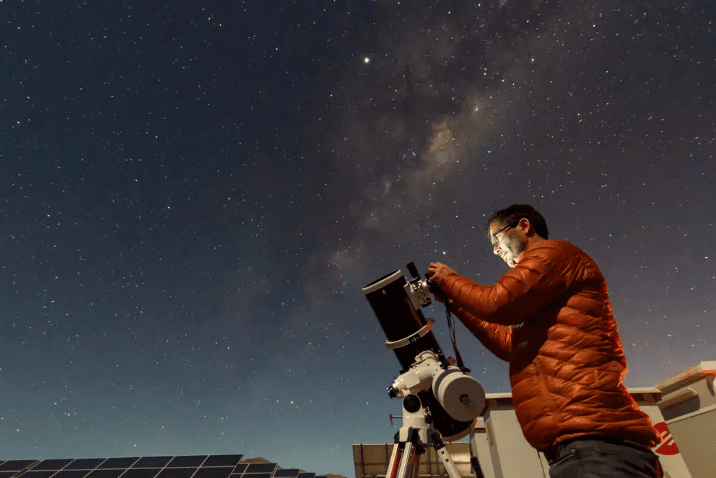 Astronomical telescope under the night sky